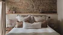Savour lingering lie ins in the dreamy king size bed