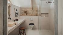 An ensuite shower room adds a touch of convenience to your stay