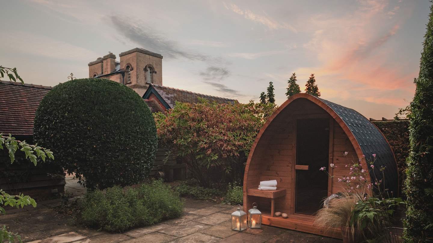 A wood-clad sauna invites you to recline in Scandi-style