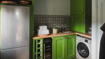 A considered pantry hosts a range of appliances for use throughout your stay