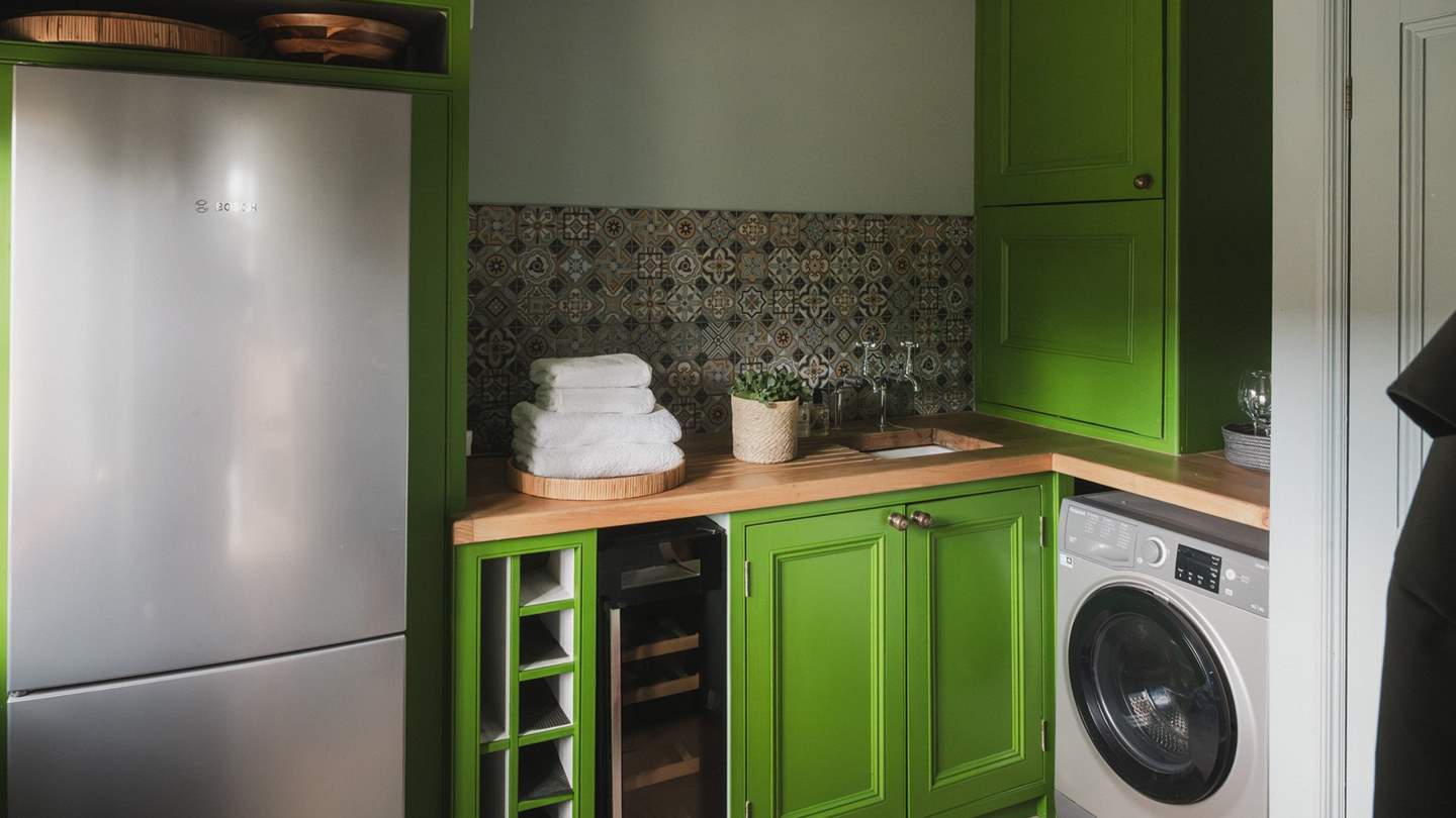 A considered pantry hosts a range of appliances for use throughout your stay