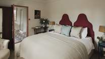 The first dreamy bedroom boasts two twin beds, which can be set up as one sumptuous super king