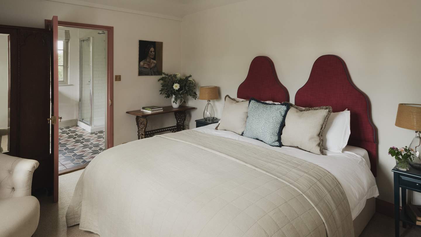 The first dreamy bedroom boasts two twin beds, which can be set up as one sumptuous super king