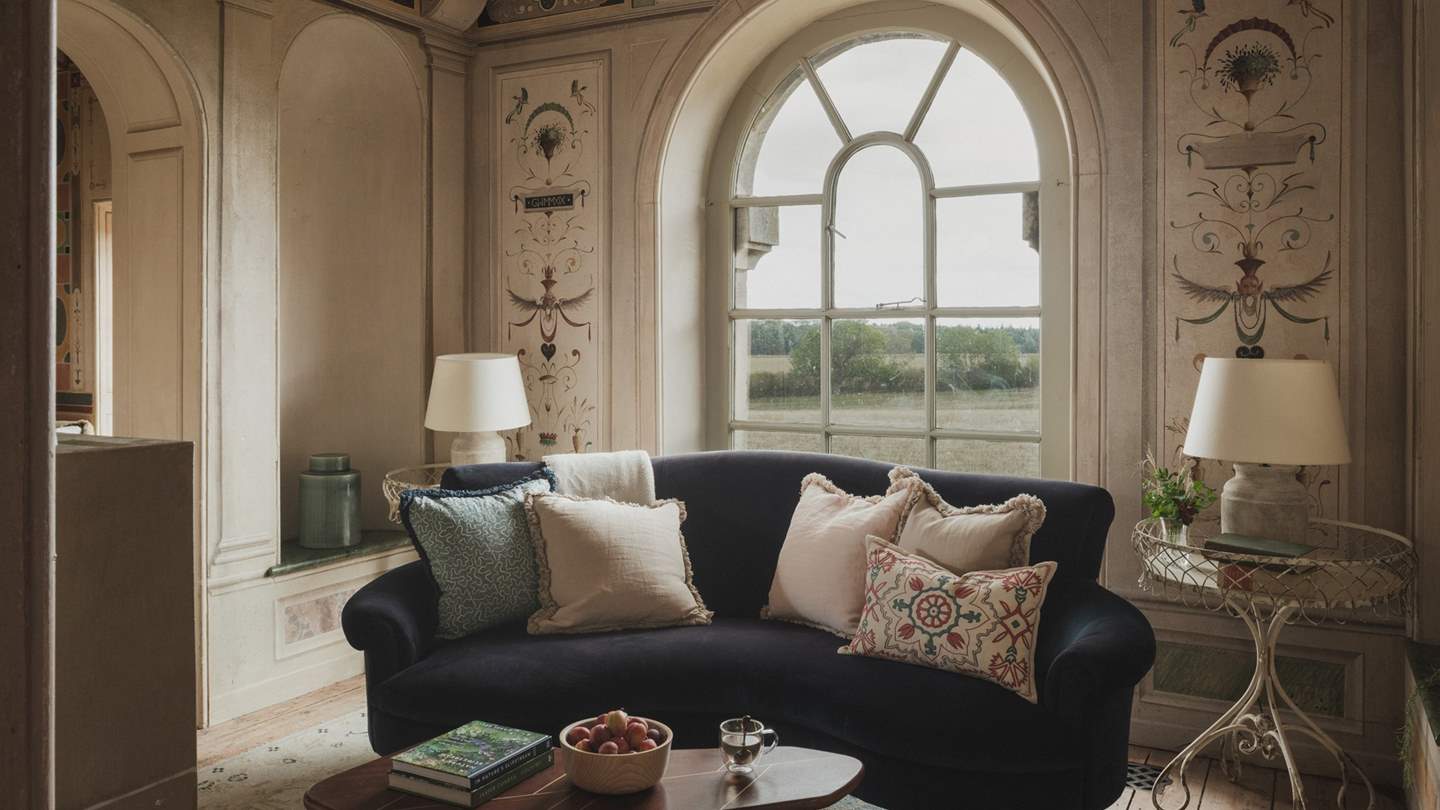 Curated interiors painted in rich tones set the scene for peaceful repose