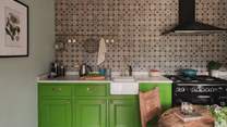 Moroccan tiles and thoughtfully curated artwork complement bespoke cabinetry 