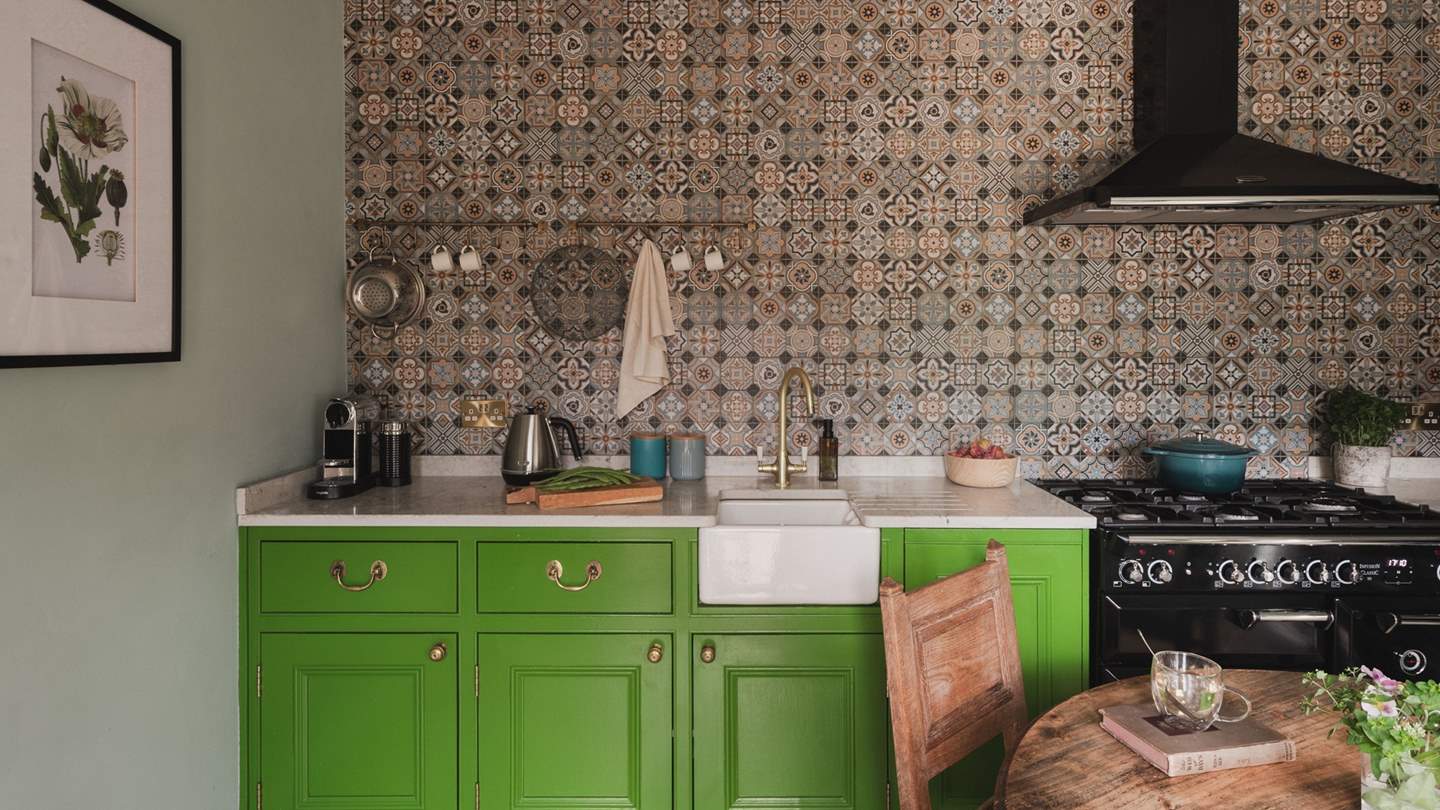 Moroccan tiles and thoughtfully curated artwork complement bespoke cabinetry 