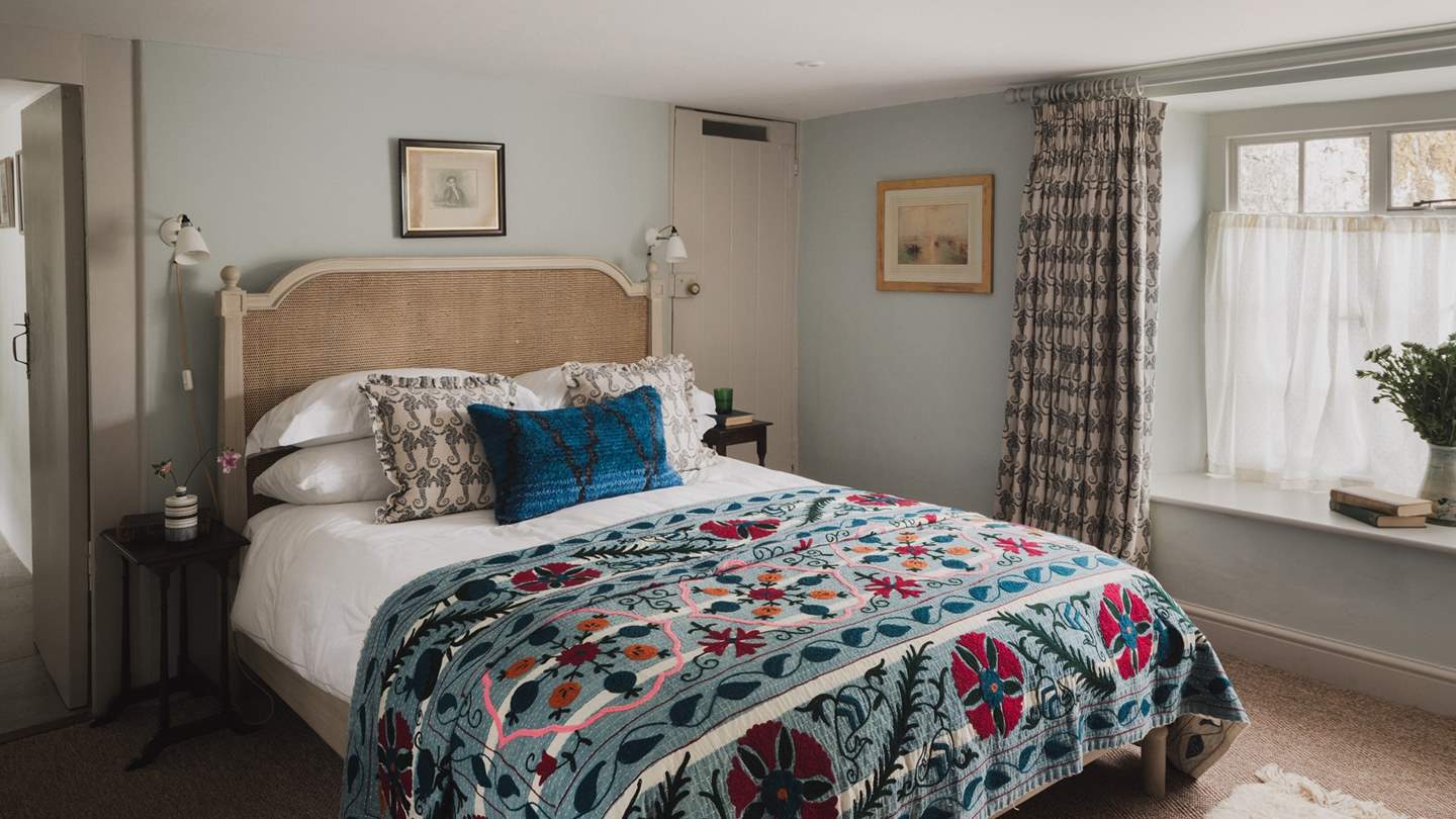 This heavenly space promises heirloom antique furniture and jute carpet underfoot