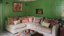 Beautiful sharker panelling is colour drenched in Emerald Green by Farrow and Ball