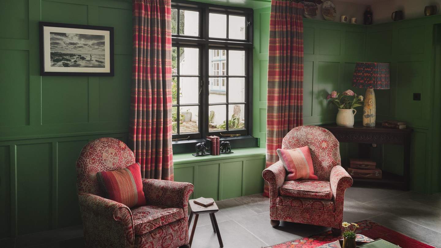 An array of seating ensures a cosy spot to gather around the Smart TV in the cooler months