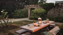 A backdrop inviting for evening conversation with a glass in hand
