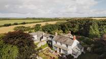 Our dreamy country abode is enveloped by emerald-green countryside and sheep-dotted paddocks