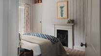 Effortlessly elegant, ’Stripe’ is beautifully adorned with classic striped wallpaper 