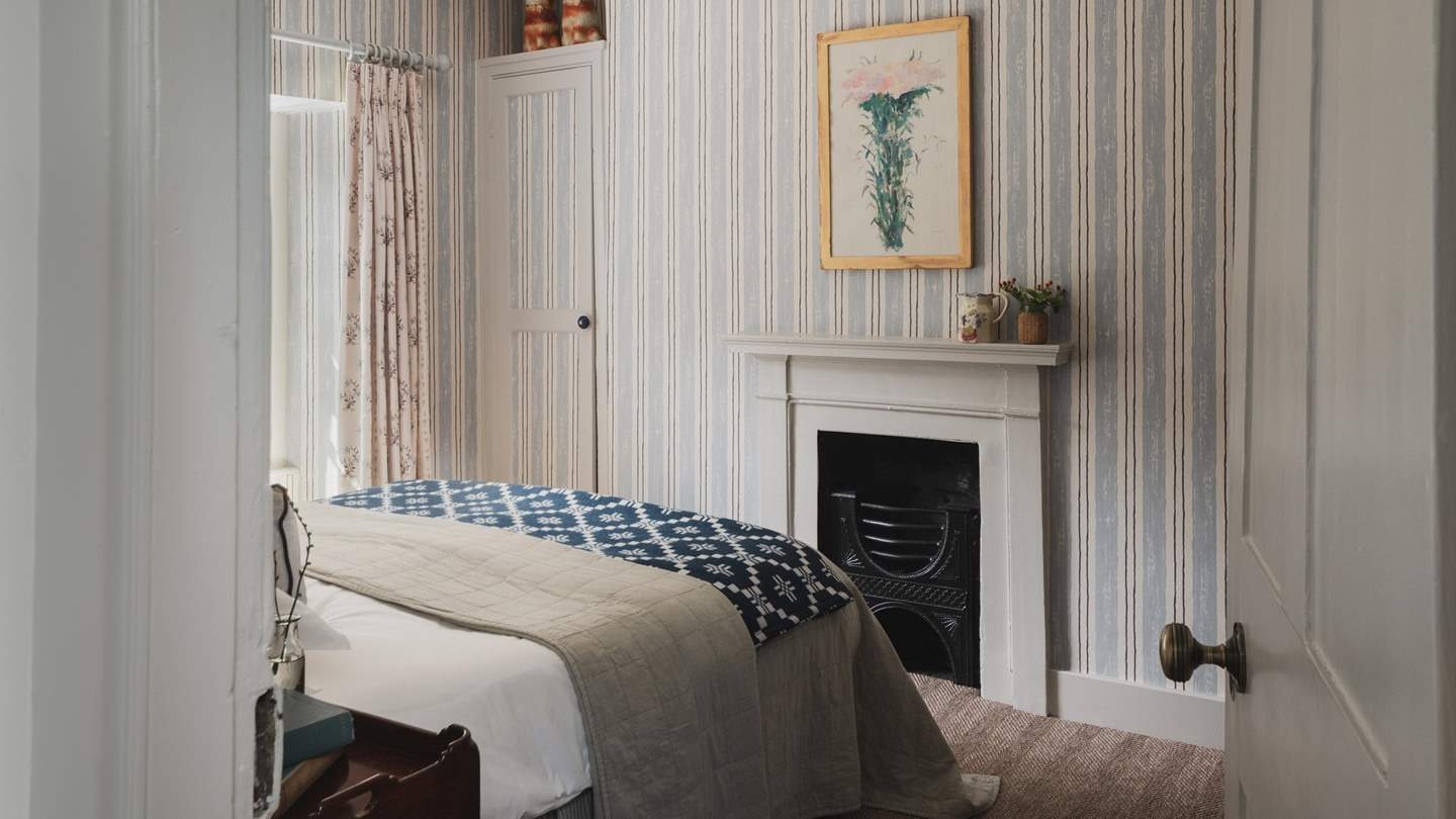 Effortlessly elegant, ’Stripe’ is beautifully adorned with classic striped wallpaper 
