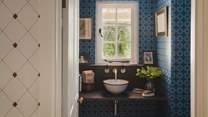 Uncover the eclectic downstairs WC, found in the cloakroom 