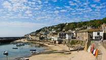 Nestled in the heart of Mousehole, the gorgeous harbour is a short stroll away