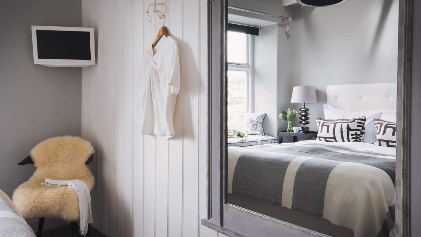 We just love the soft whites and greys that make this room such a soothing retreat away from the world
