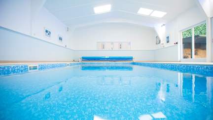 Enjoy the shared swimming pool at The Gatehouse