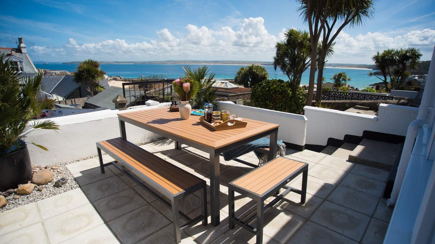 A sun-soaked terrace promising endless ocean vistas to soothe the soul