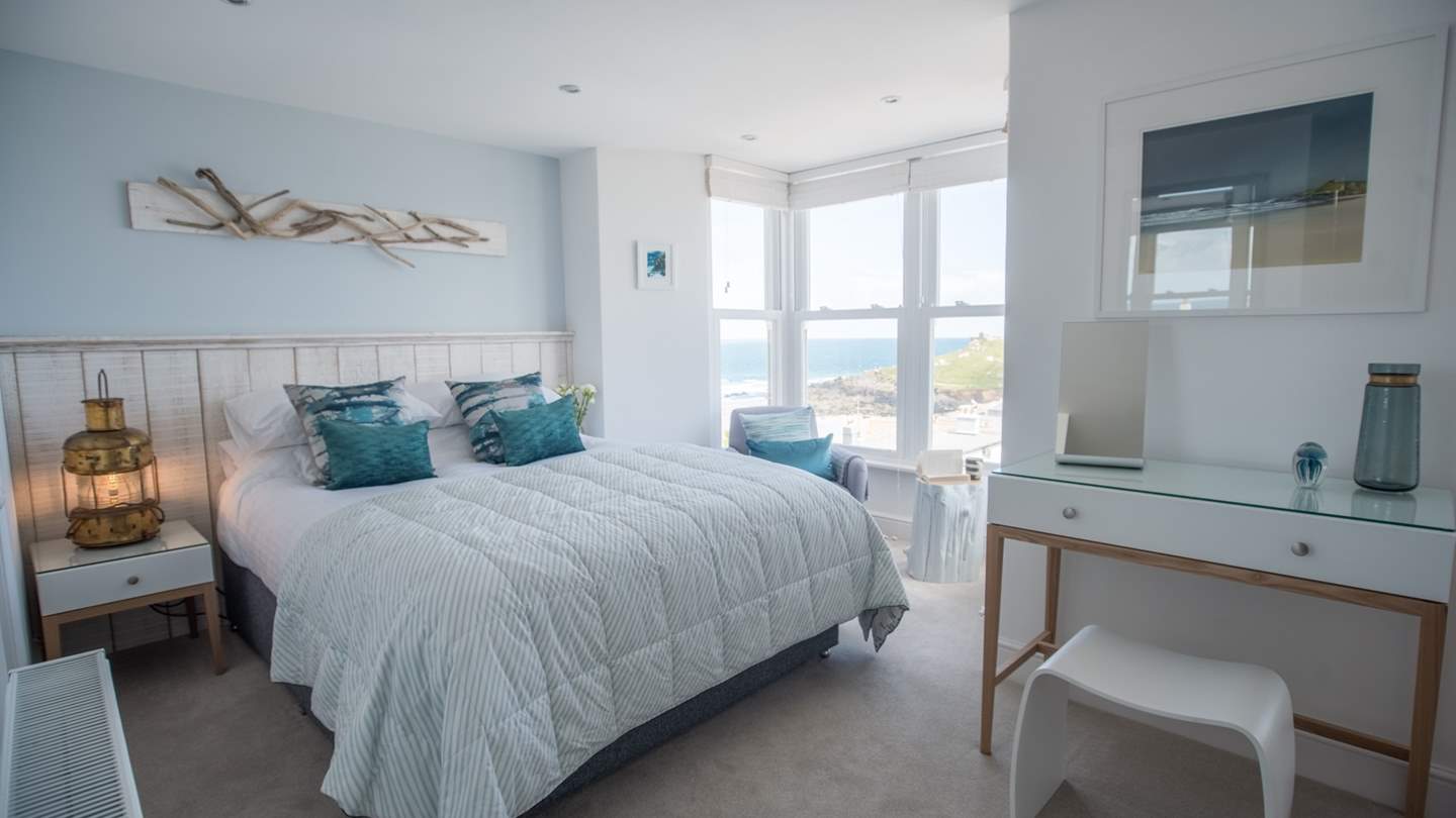 Wake up to the sound of the Cornish waves in this alluring bedroom. 