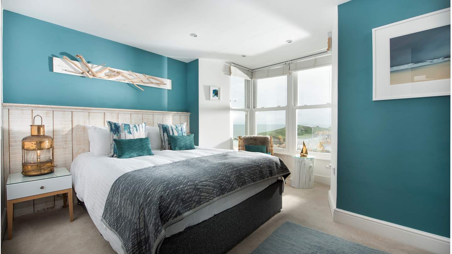Wake up to the sound of the Cornish waves in this alluring bedroom. 
