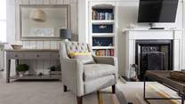 The calming living space houses cosy, comfortable seating for slow moments 
