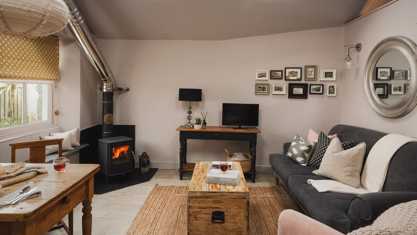 Enjoy moments of relaxation beside the oh-so-cosy wood burner