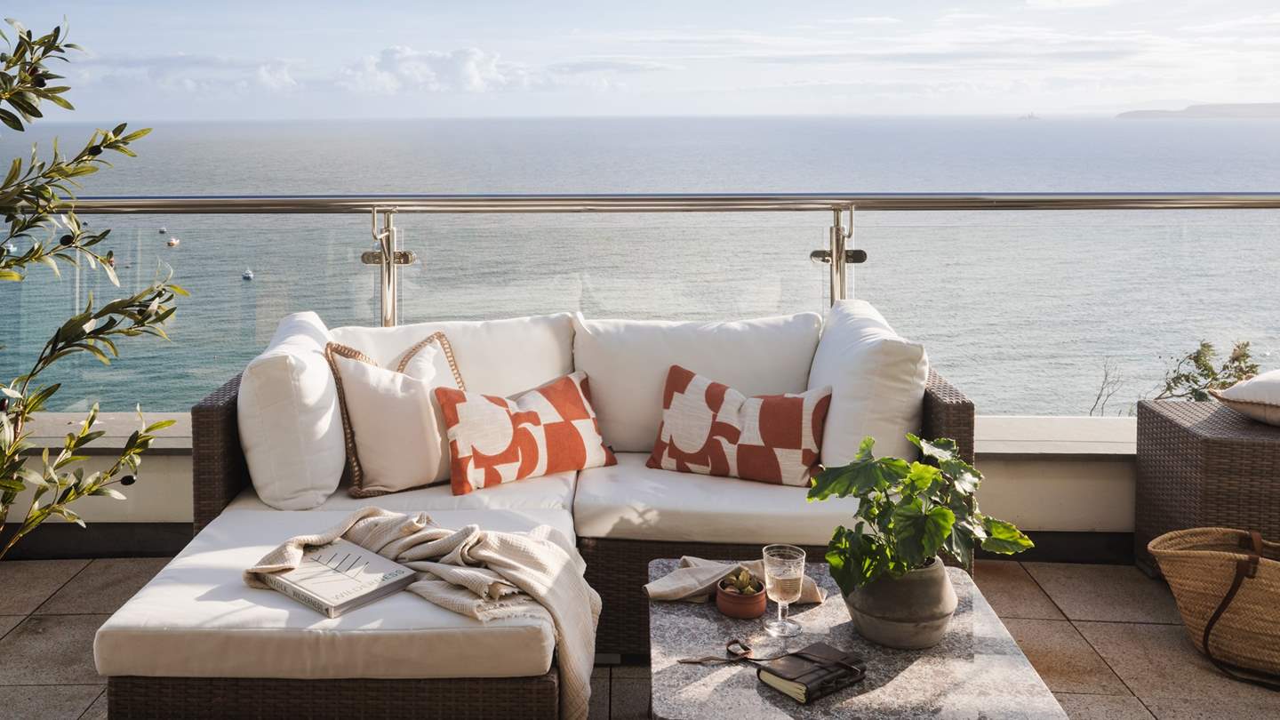 Admire the picturesque coastal scenes of gently swaying fishing boats from West Penthouse’s spacious balcony
