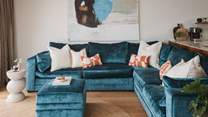 Taking centre stage is the sumptuous, teal-toned, velvet sofa by Duresta