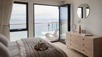 With far-reaching vistas of Porthminster beach and postcard-pretty St Ives, our oceanside retreat is a sanctuary for the romantic souls...