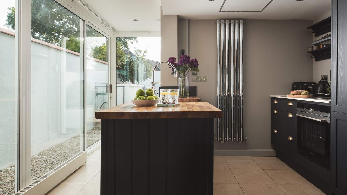 Finished to a high standard, this tasteful and modern kitchen is ideal for creating a family meal or a romantic supper for two