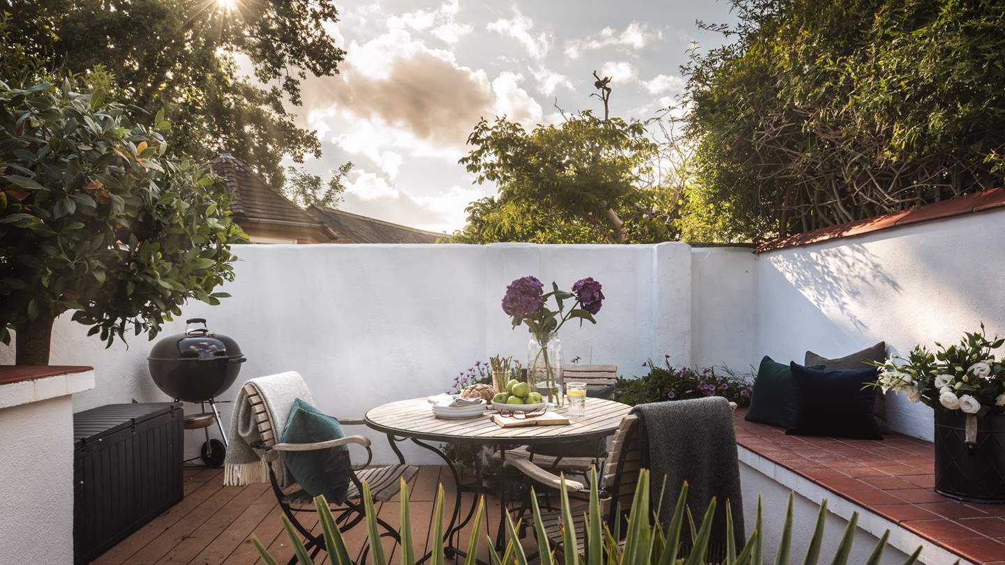 Enjoy a spot of al fresco dining in the lovely sheltered courtyard