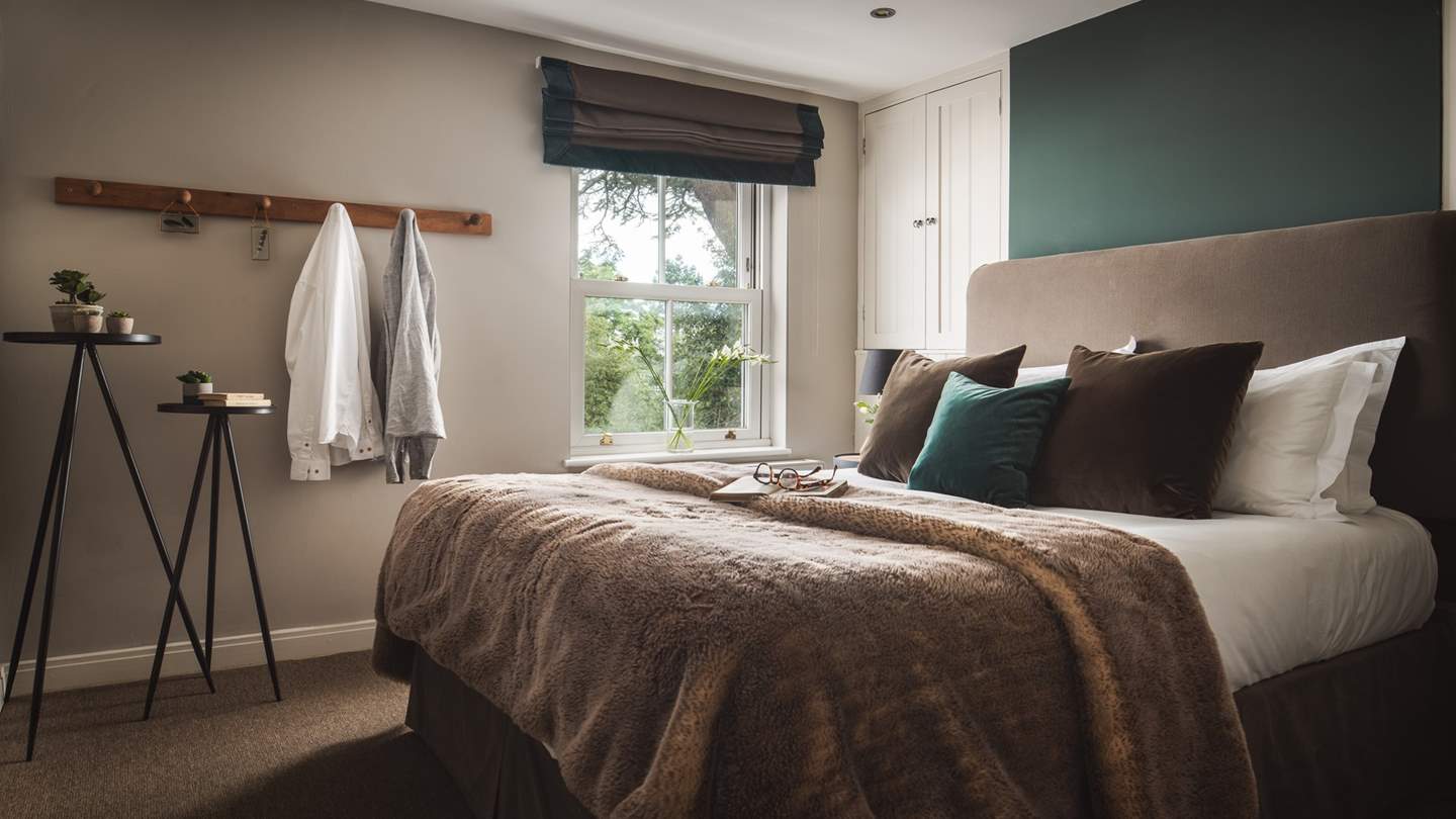 The master bedroom has river views and a king size, super comfy bed.