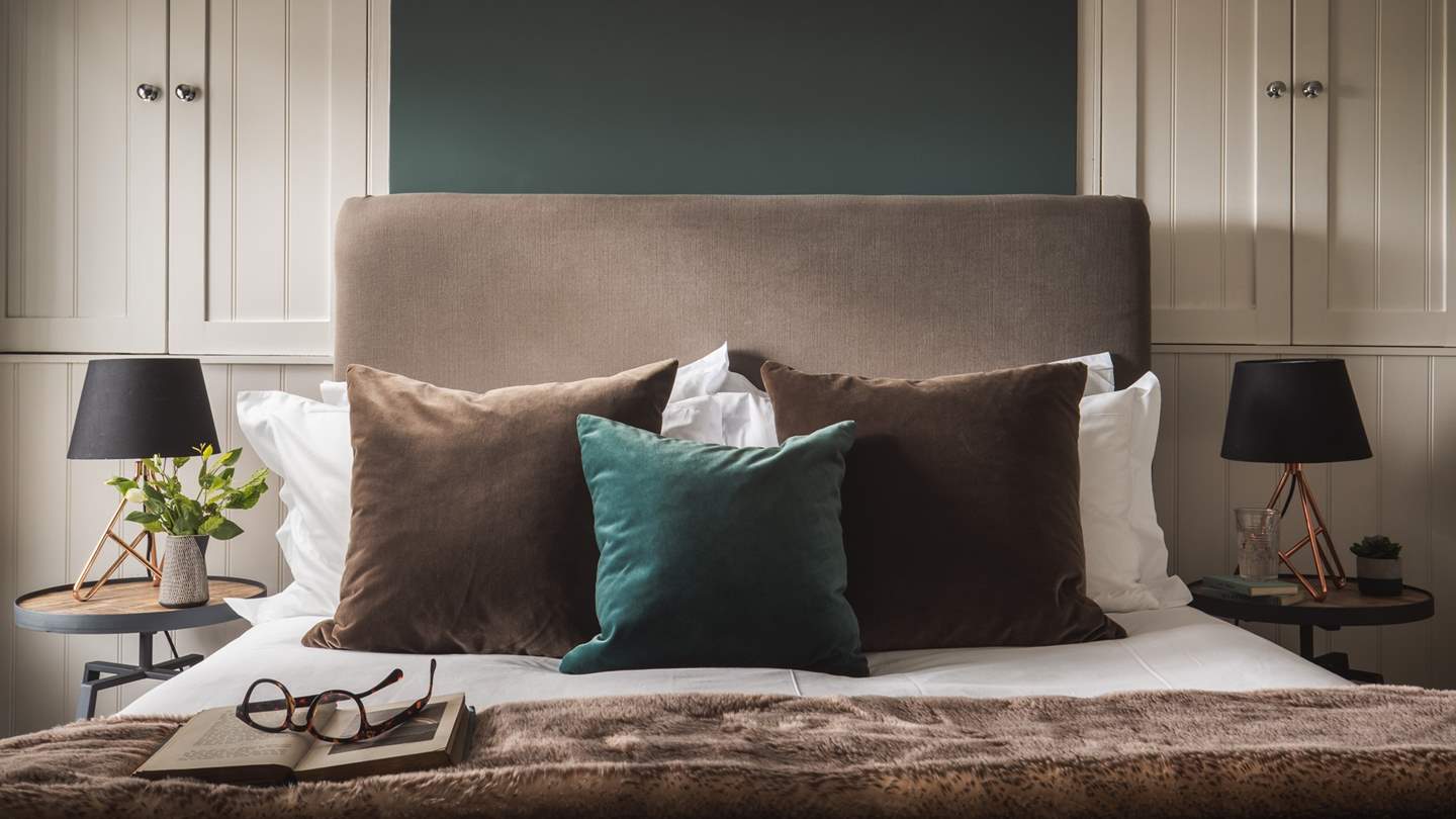 The bed is draped in the softest fur throws and cushions to ensure the perfect night’s sleep 