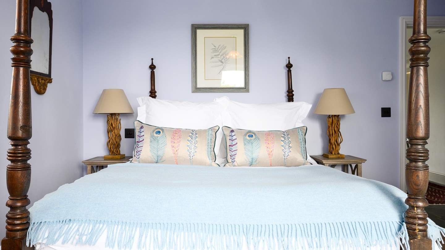 All beds are adorned with lovely throws and cushions
