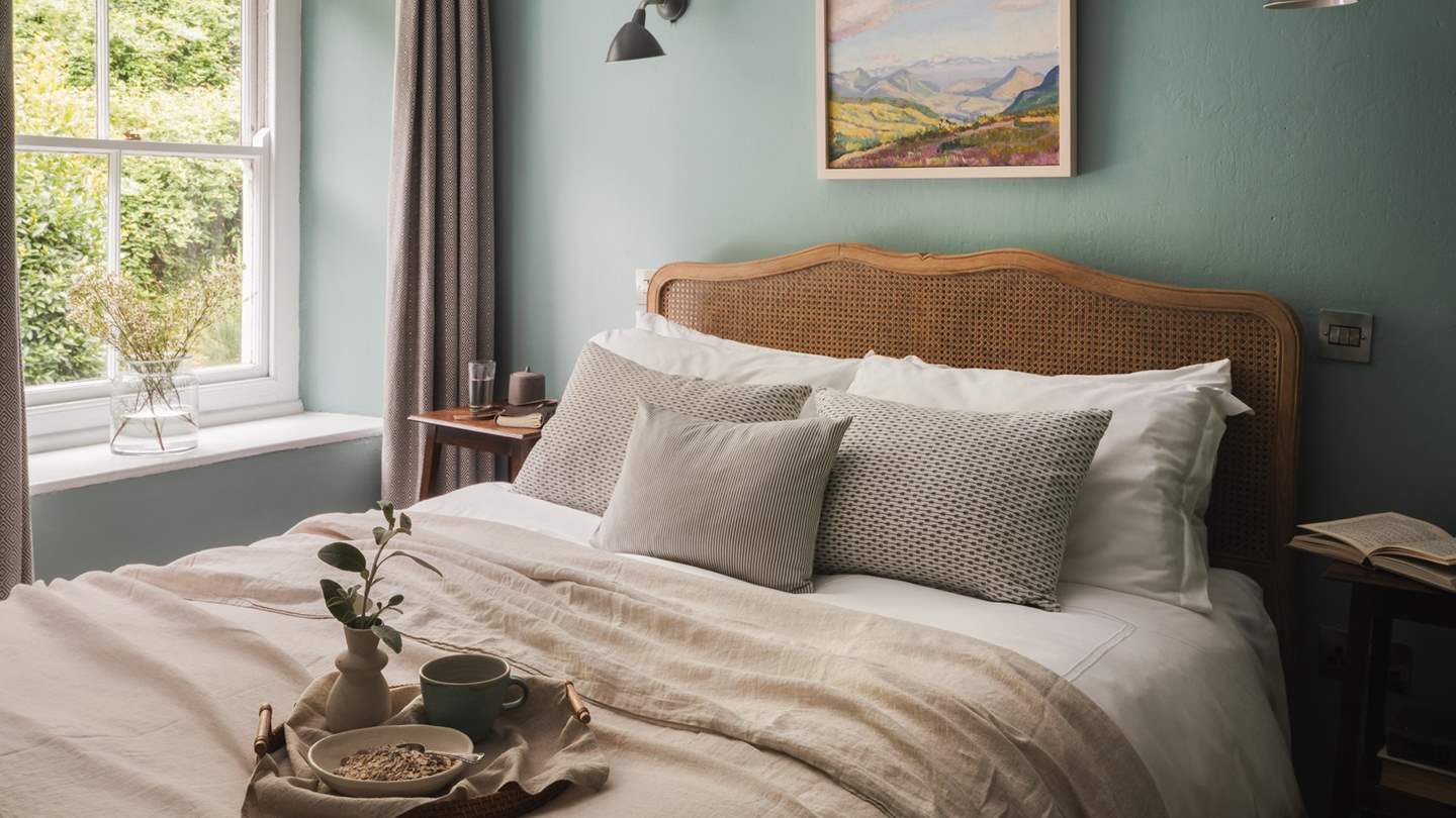 The master bedroom rests on the first floor and is home to a comfortable king-size Loaf bed draped in the finest linens for serene slumbers