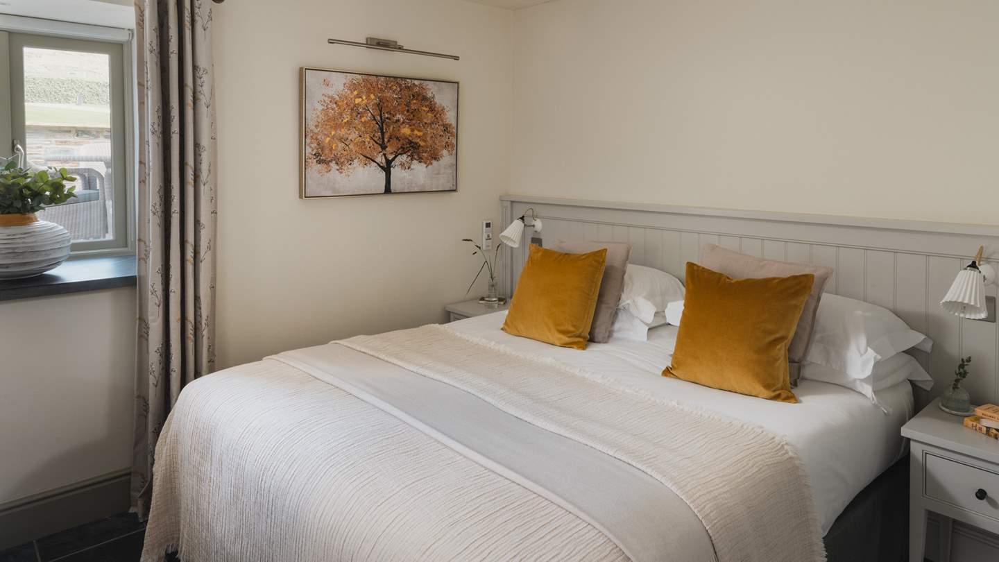 The sweet second bedroom promises a restful repose