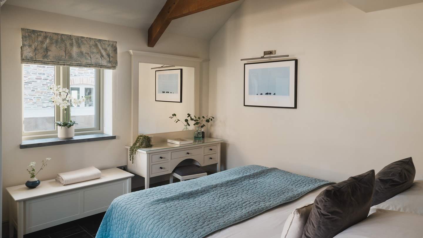 This roomy retreat sleeps six with three luxurious bedrooms