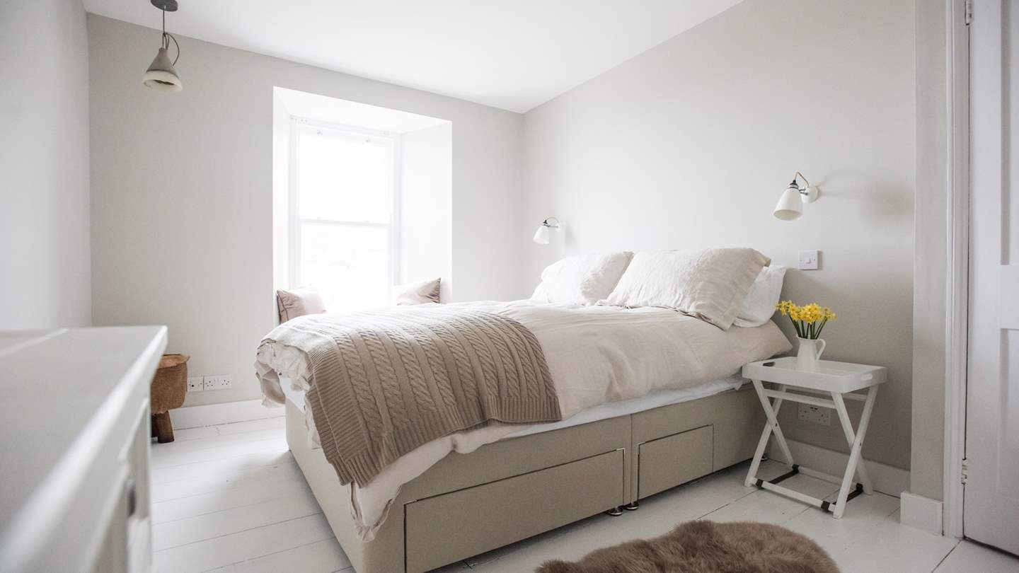 A symphony in white, the super-romantic bedroom is just delightful and the perfect place for a snooze.