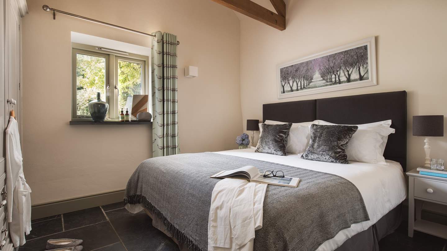 Calling for slow mornings and restful nights, the second bedroom is simply a delight