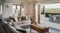 Push open the bi-fold doors on balmy days to enjoy endless countryside-vistas at our heavenly retreat