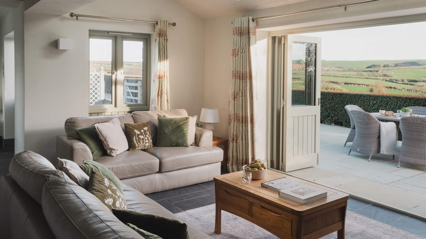 Push open the bi-fold doors on balmy days to enjoy endless countryside-vistas at our heavenly retreat