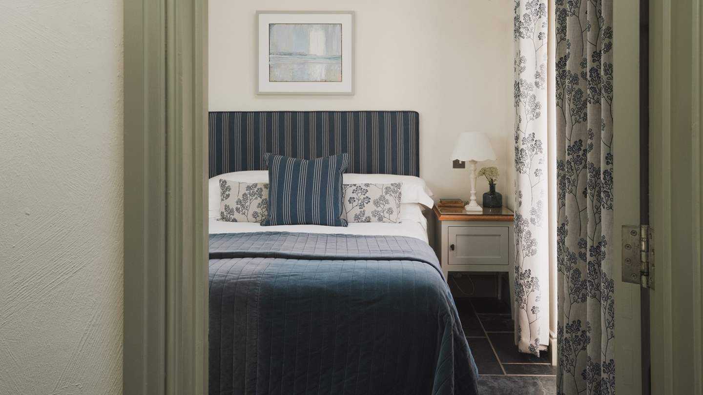 Slip softly into the king-sized bed, swathed in luxurious linens, soft bedding