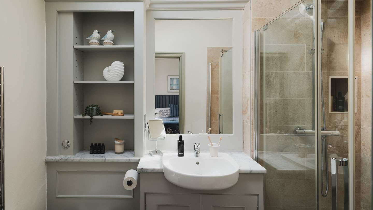 You'll find a spacious walk-in shower for refreshing wake-me ups