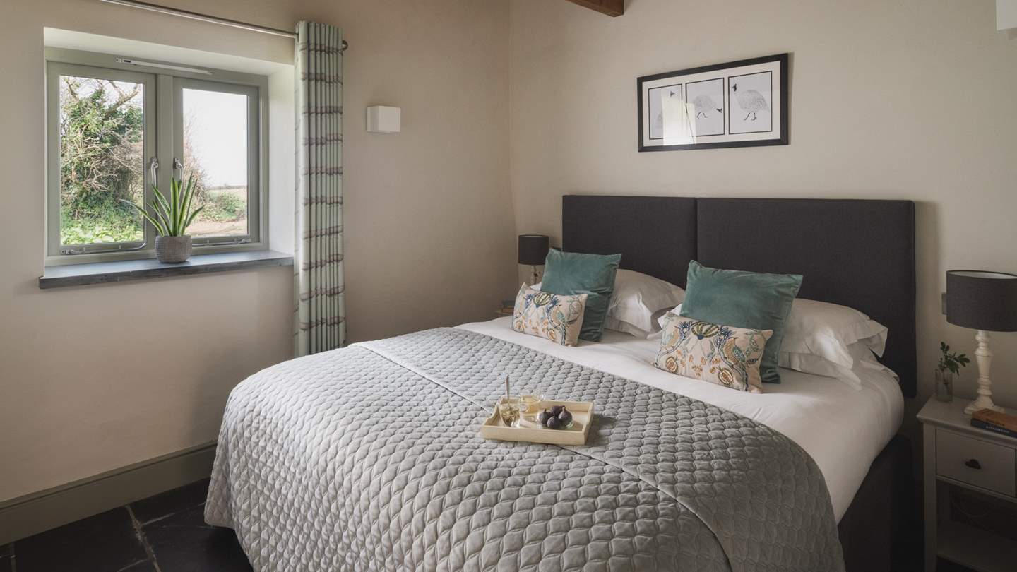 Calling for slow mornings and restful nights, the second bedroom is simply a delight