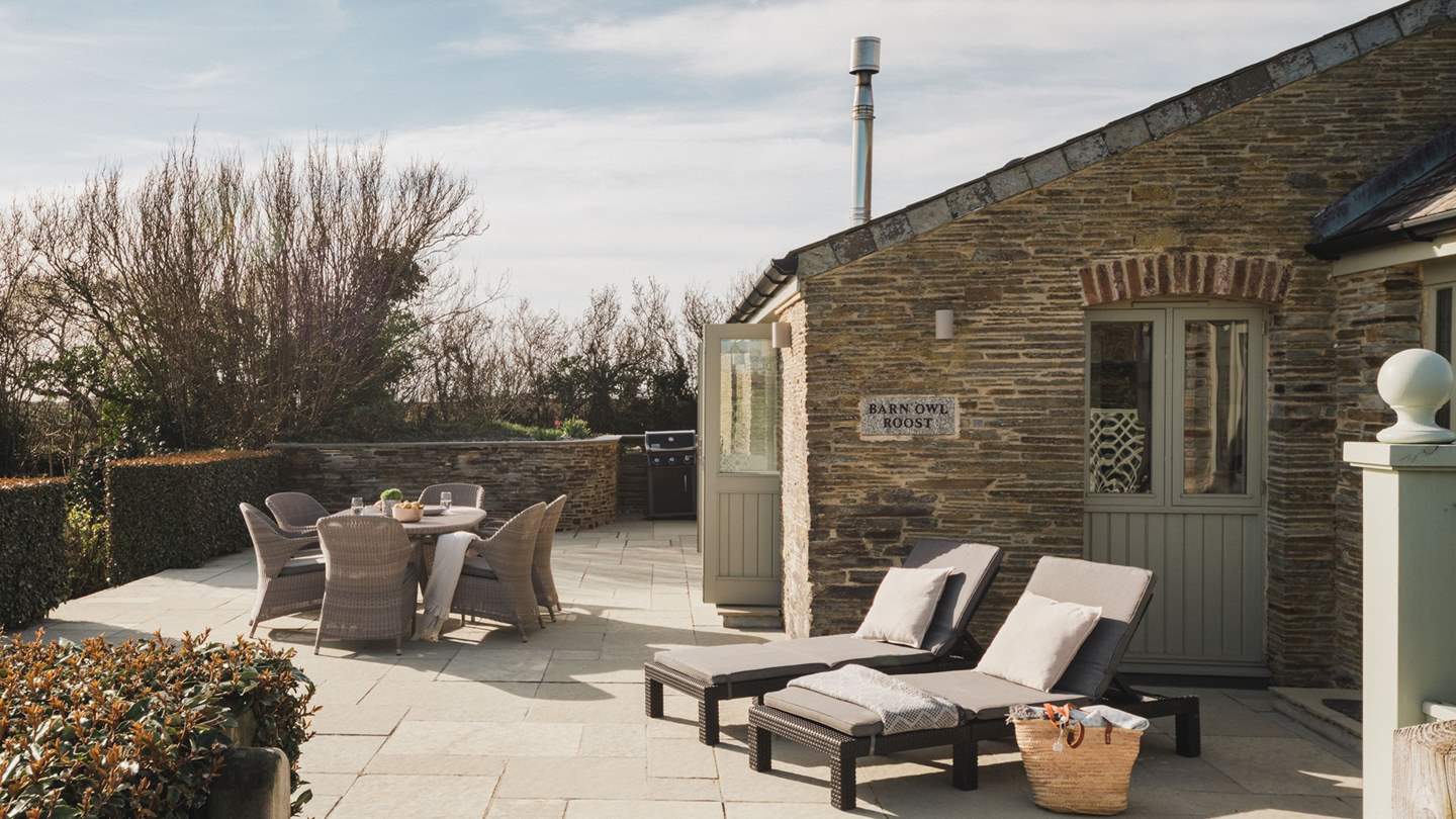 The fully enclosed patio and garden to the front of the cottage affording great views of the rolling coutryside opposite